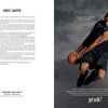 Vince Carter, clad in black basketball gear, leaps and smiles while holding a ball. Against a gray backdrop, white text reads "Milk Mustache" from Schiffer Publishing, Ltd., a classic ad celebrating milk's benefits for athletes.