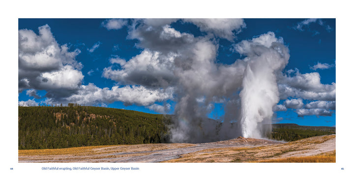 Yellowstone National Park by Schiffer Publishing, Ltd. captures Old Faithful erupting with a soaring steam column under a blue, cloud-dotted sky, surrounded by grasslands and forest—highlighting one of the park’s most iconic geothermal wonders.