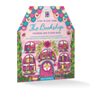 Bright and inviting, the illustrated cover of A Day in Cozy Town: The Bookshop Coloring and Sticker Book from Schiffer Publishing, Ltd. is house-shaped with heart and flower accents. The title features this charming pink bookshop with an open sign and floral details, welcoming readers to a whimsical bookstore adventure. Includes Cozy Town stickers for adding your own creative flair to this delightful coloring book experience.