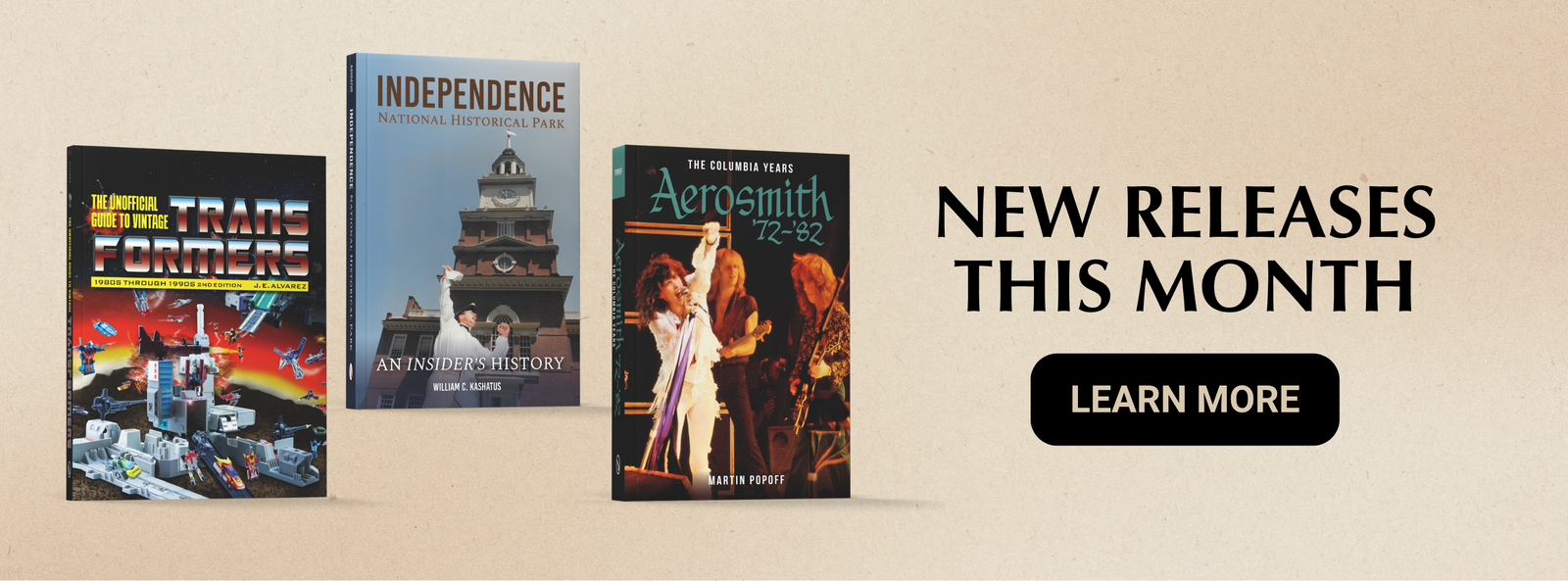 Three book covers are displayed side by side on a beige background with promotional text reading 'NEW RELEASES THIS MONTH' and a 'LEARN MORE' button. The visible titles include Transformers, Independence, and The Golden Age of Aerosmith.