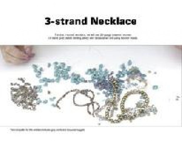 Hands arrange blue and metallic beads on a white surface, ready to craft a 3-strand necklace using techniques from Beads & Wires Jewelry by Schiffer Publishing, Ltd. The text "3-strand Necklace" appears above.