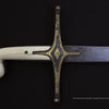 A close-up of a historical sword from Weapons of Warriors by Schiffer Publishing, Ltd. features an ivory-colored curved handle and ornate gold crossguard, reminiscent of Arabic swords, set against a black background.