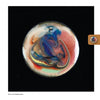Enameling by Schiffer Publishing, Ltd. features a circular abstract design with swirling blue, red, orange, and white on black—evoking marbled enamel jewelry and offering inspiration for beginner enameling or jewelry-making enthusiasts.