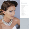 A woman with vintage hair and soft makeup wears the Fresh Floral Jewelry by Schiffer Publishing, Ltd.—a detailed beaded diamante necklace with floral accents. She poses by a pale background beside a list of materials and flowers used.