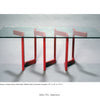 Ironwork Today 3 by Schiffer Publishing, Ltd. features a modern coffee table with a rectangular glass top and red zigzag steel legs resembling metal sculpture, casting dynamic shadows below.