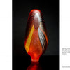 Art Glass Today" by Schiffer Publishing, Ltd. features stunning glass sculptures, like tall ovals with swirling red, orange, yellow, and black patterns. Light reveals their intricate textures and expert artistry against dark backgrounds.