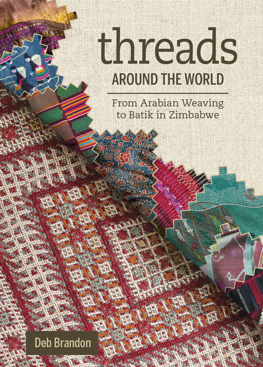 Knitting Around the World used book by Threads Magazine: 9781561580262